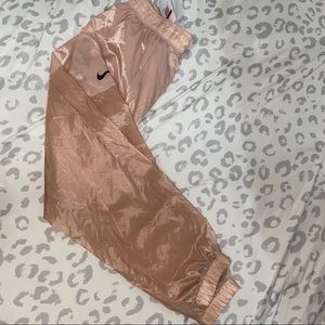 Nike Swoosh Joggers in light pink